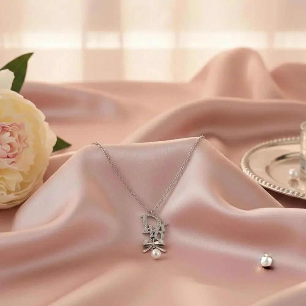 Christian Dior Silver Ribbon Pearl Pendant Necklace - Picture 5 of 6